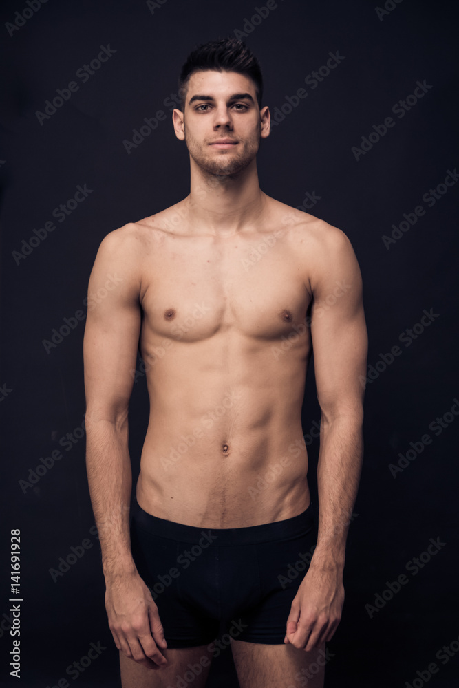 Fototapeta premium one young man shirtless underwear, looking at camera