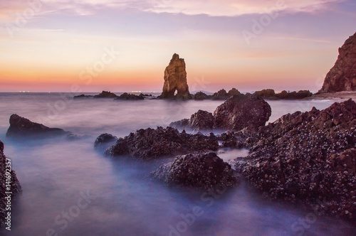 Long exposure of sea and big stone in twilight time