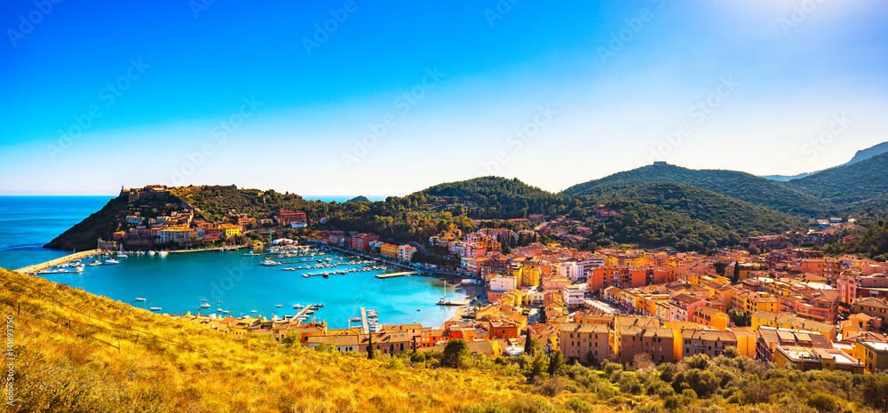 Porto Ercole village panorama and harbor in a sea bay. Aerial view, Argentario, Tuscany, Italy
