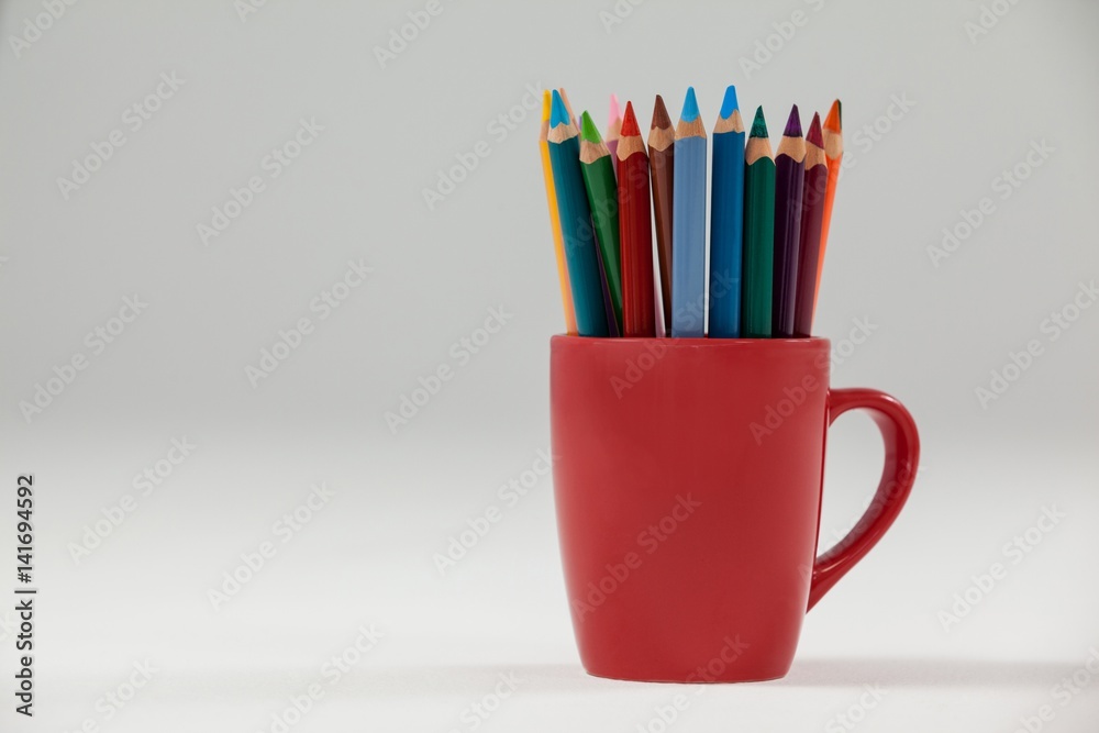 Colored pencils kept in cup Colored pencils kept in cup