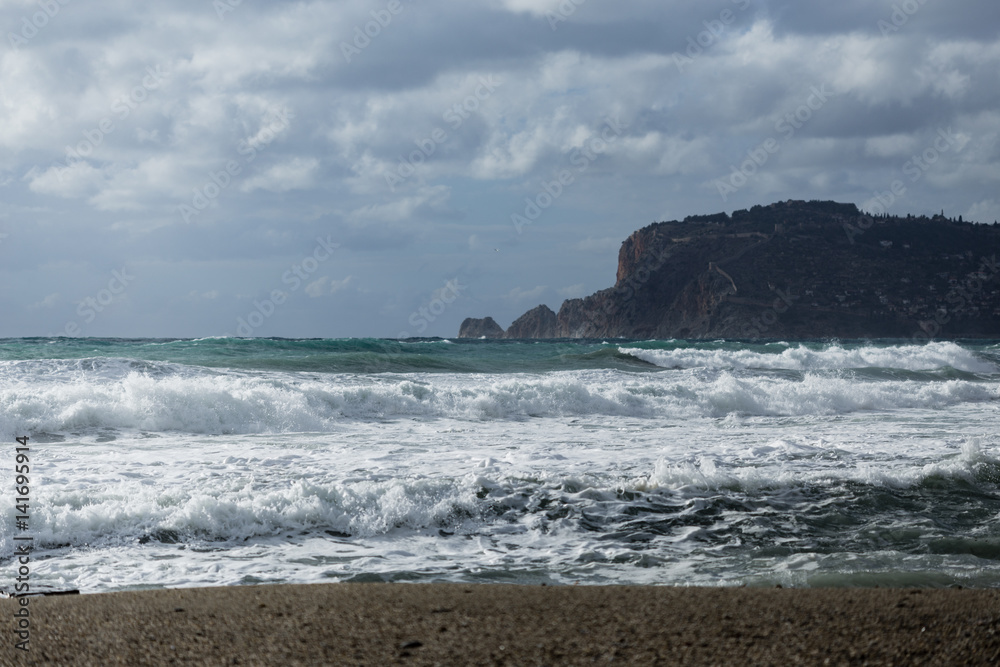 Powerful waves in Alanya shot on cloudy day