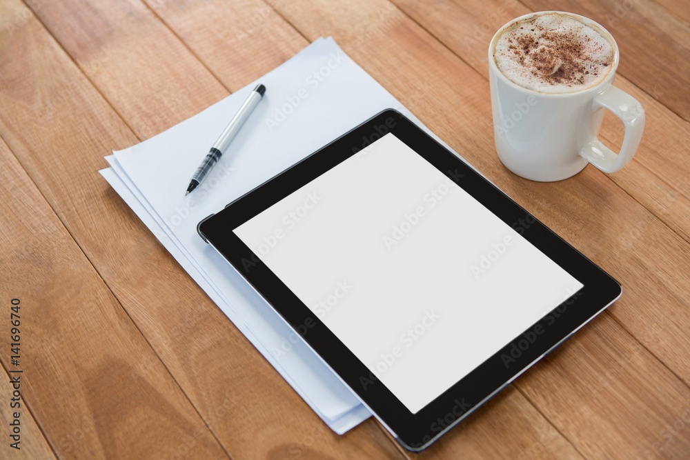 Coffee with digital tablet and paper Coffee with digital tablet and paper