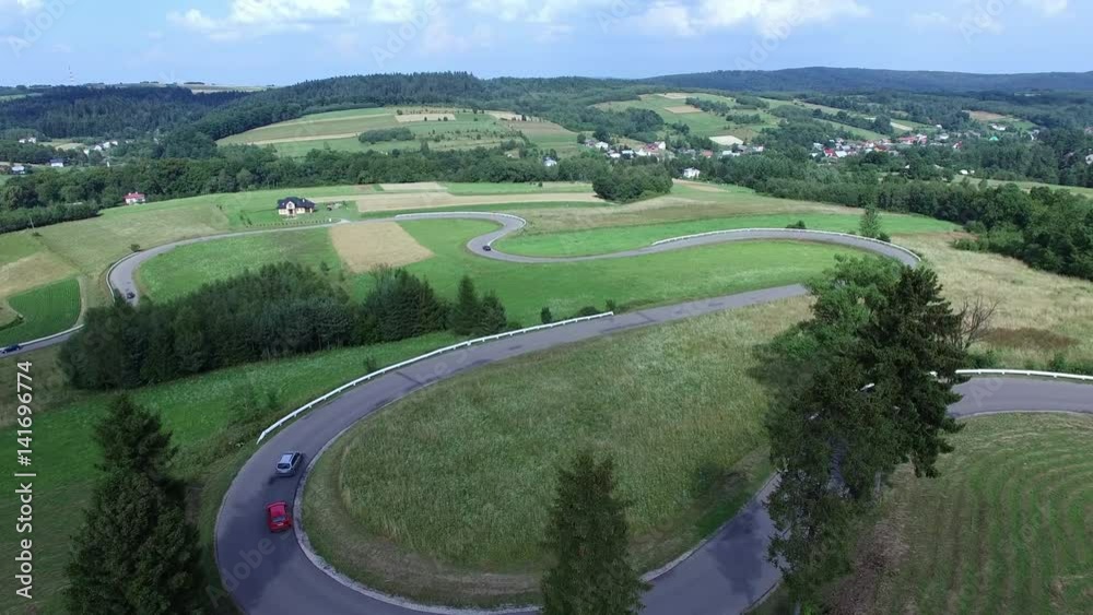 Aerial Of Cars Driving Winding Switchback Road Aerial Of Cars Driving Winding Switchback Road