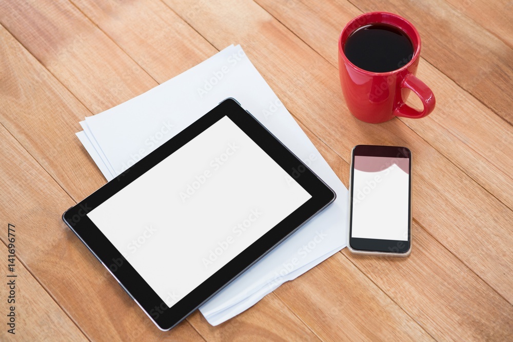 Coffee with digital tablet and mobile phone Coffee with digital tablet and mobile phone