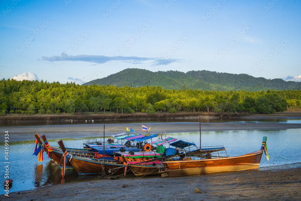 Wooden fisherman boats on river in Thailand