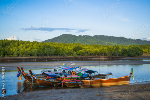 Wooden fisherman boats on river in Thailand