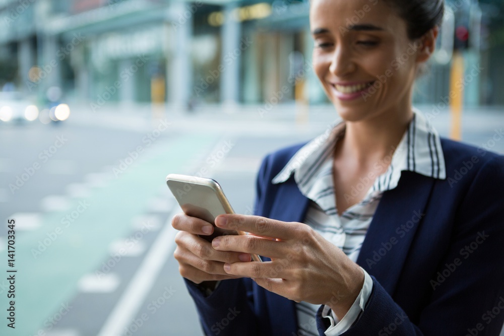 Business executive using mobile phone Business executive using mobile phone