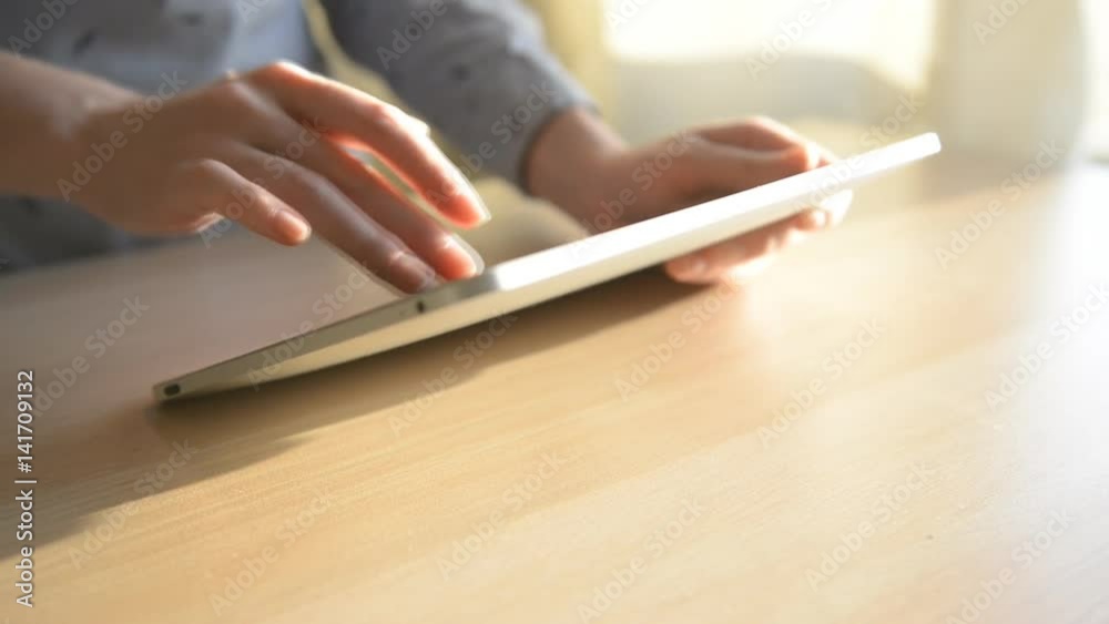 hand touching tablet computer surface touchscreen
hand touching tablet computer surface touchscreen