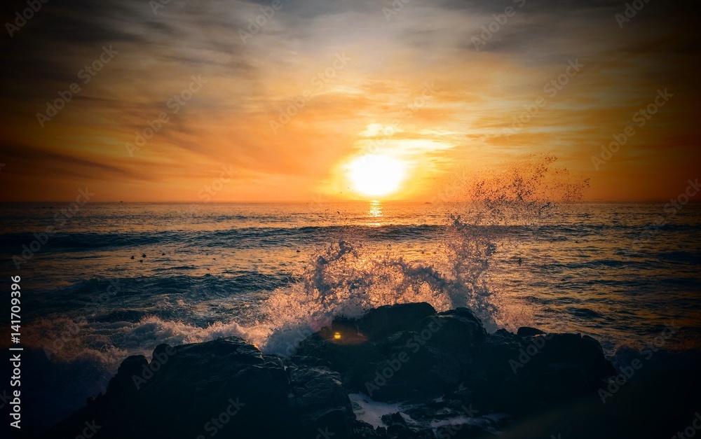 Sunset through the waves sea point promenade Cape Town Sunset through the waves sea point promenade Cape Town