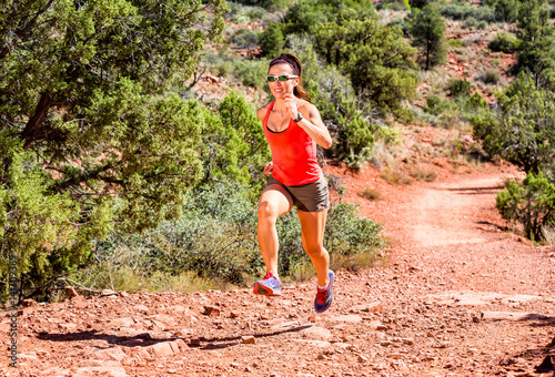 Woman Running Up Hill