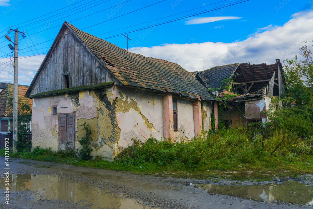 Old abandoned house on the edge of the village