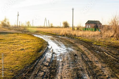 Wet muddy country road