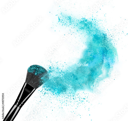 Obraz na plátně Make up brush with powder splash isolated on white background