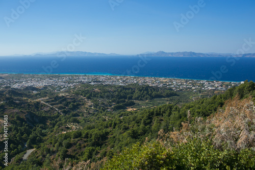 LINDOS, RHODES, GREECE: Aerial view of landscape and over town