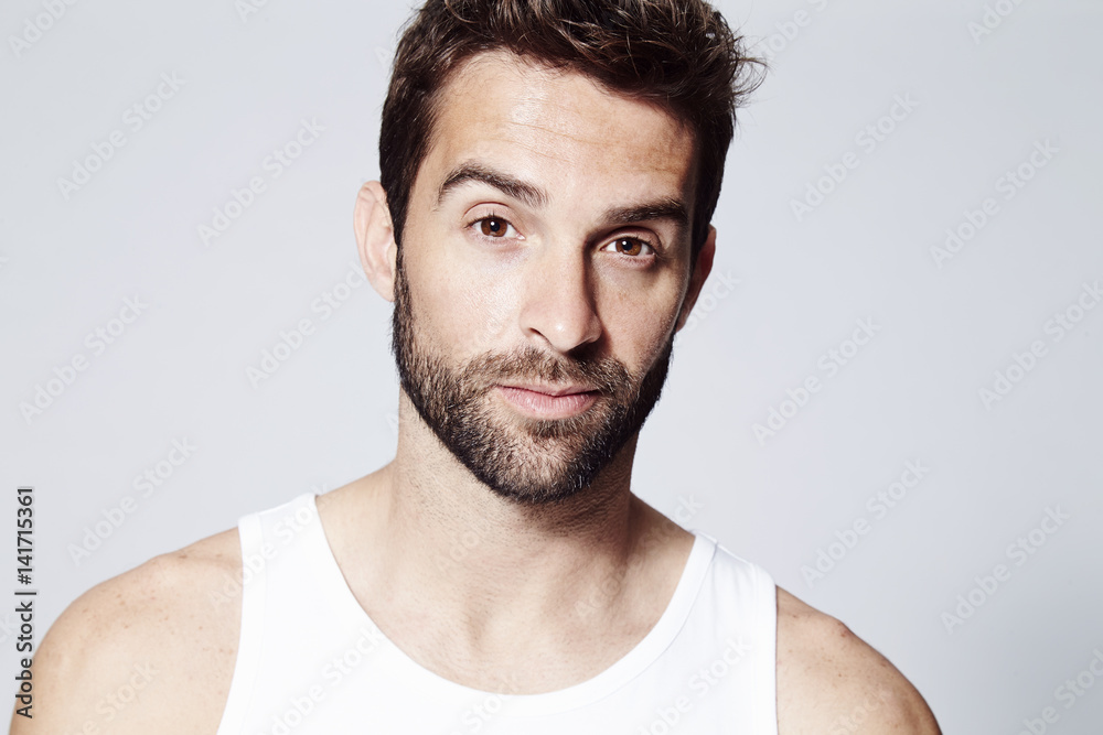 Fototapeta premium White vest dude looking at camera