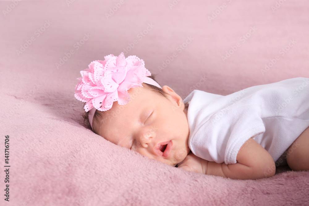 Cute little baby sleeping on bed at home Cute little baby sleeping on bed at home