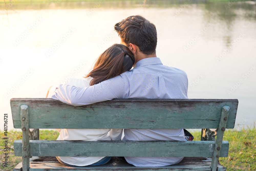 sweet couple sit on bench in the garden Stock Photo Adobe Stock