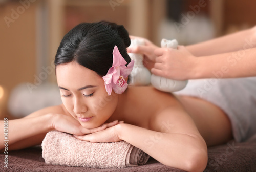 Beautiful Asian woman havin...