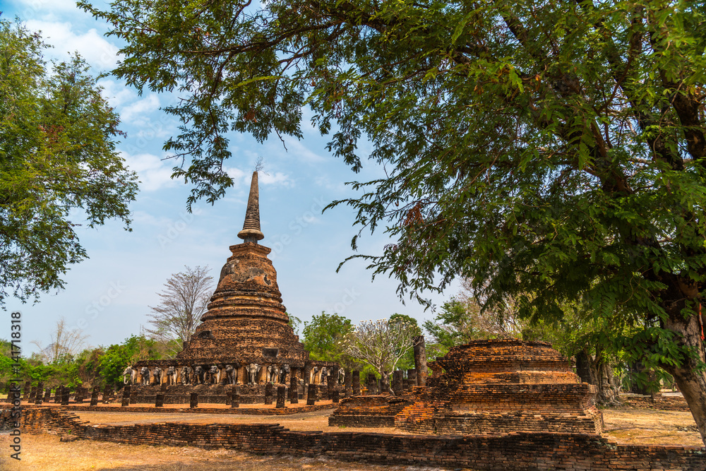 Pagodas with concrete elephant in Sukhothai historical park, travel destination of Thailand