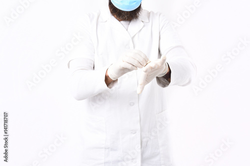 Male hands of doctor wearing medical gloves