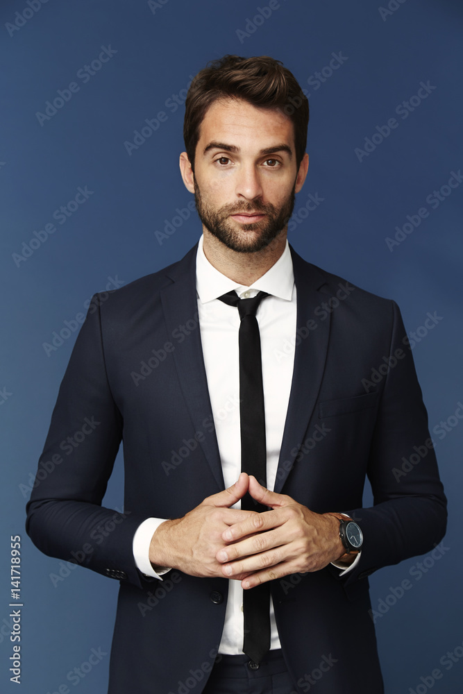 Man with stubble in smart suit, portrait Man with stubble in smart suit, portrait