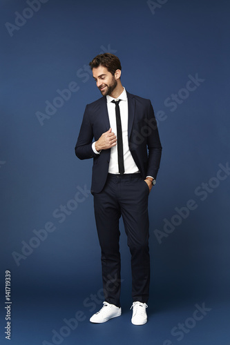 Businessman in blue studio