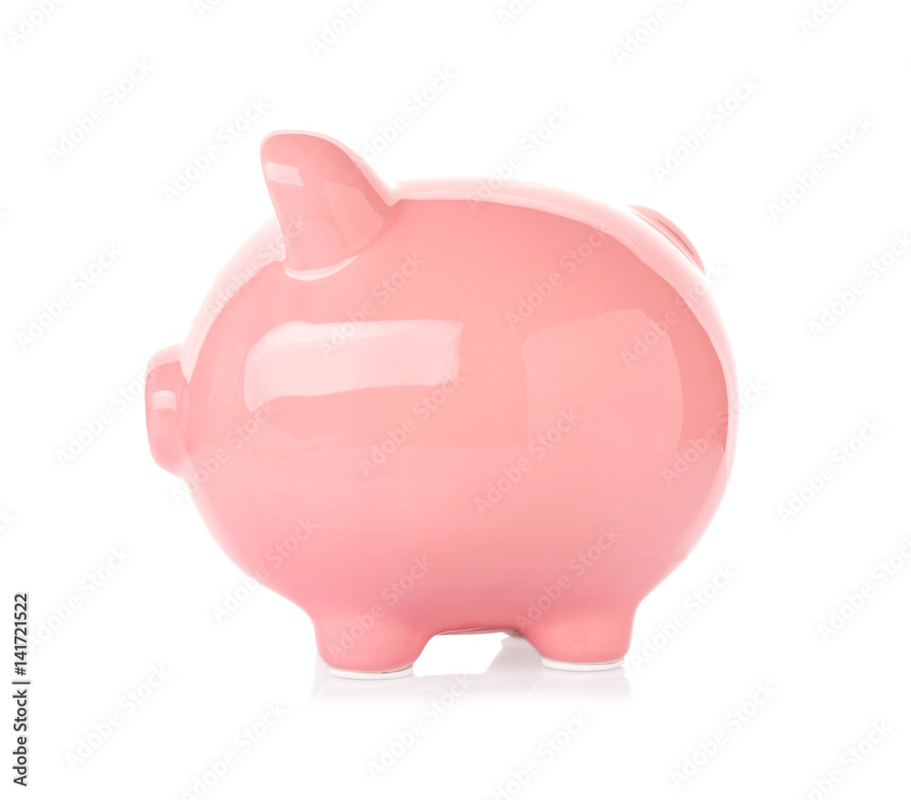 Pink ceramic piggy bank on white background