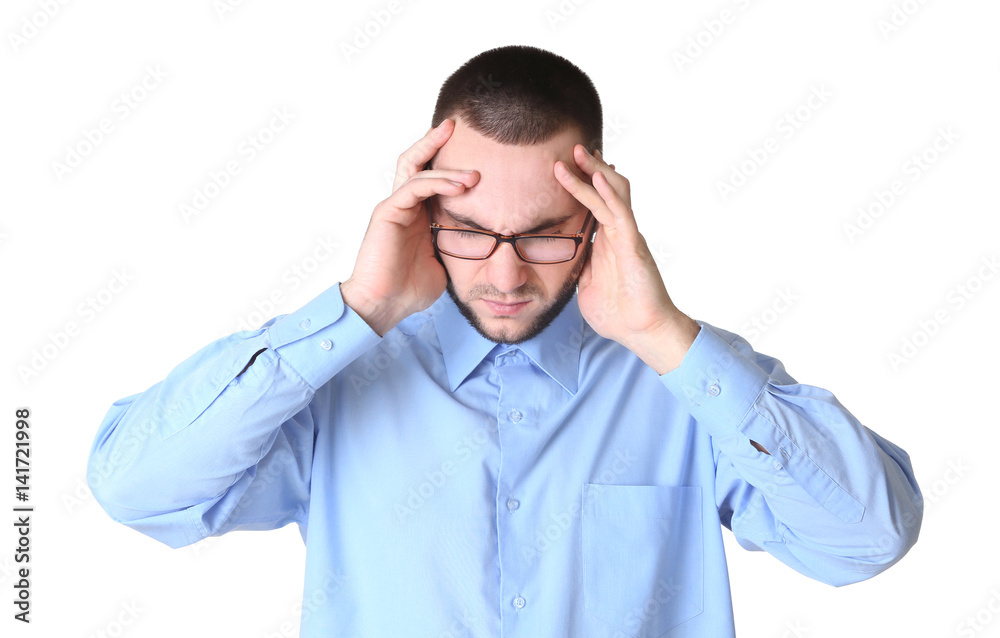 Handsome young man suffering from headache on white background Handsome young man suffering from headache on white background
