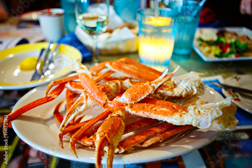 Plate with crab legs in a restaurant in Key West or New Orleans photo