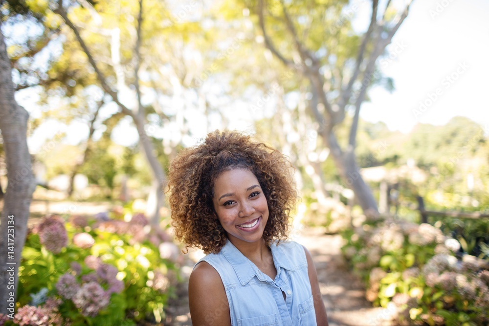 Portrait of woman standing in park Portrait of woman standing in park