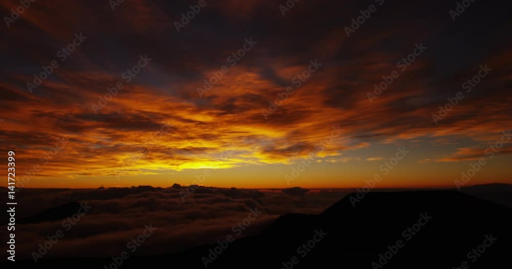 Sunrise Above Sea of Clouds from Mountain Top, Haleakala National Park Hawaii Sunrise Above Sea of Clouds from Mountain Top, Haleakala National Park Hawaii