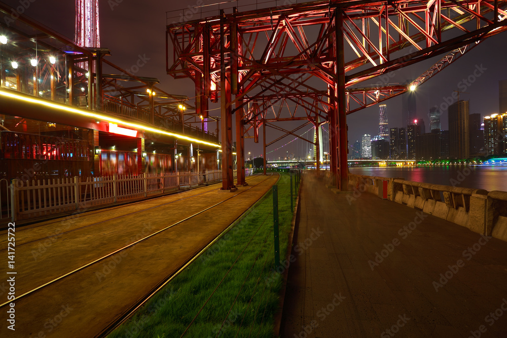 Empty road and iron tower with city landmark architecture backgrounds