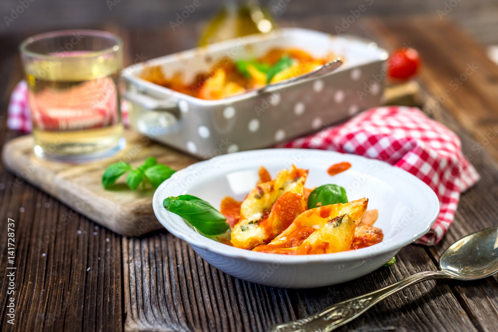 Stuffed pasta shells casserole with gorgonzola, ricotta and tomato sauce Stuffed pasta shells casserole with gorgonzola, ricotta and tomato sauce
