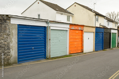 Row of painted garage doors photo
