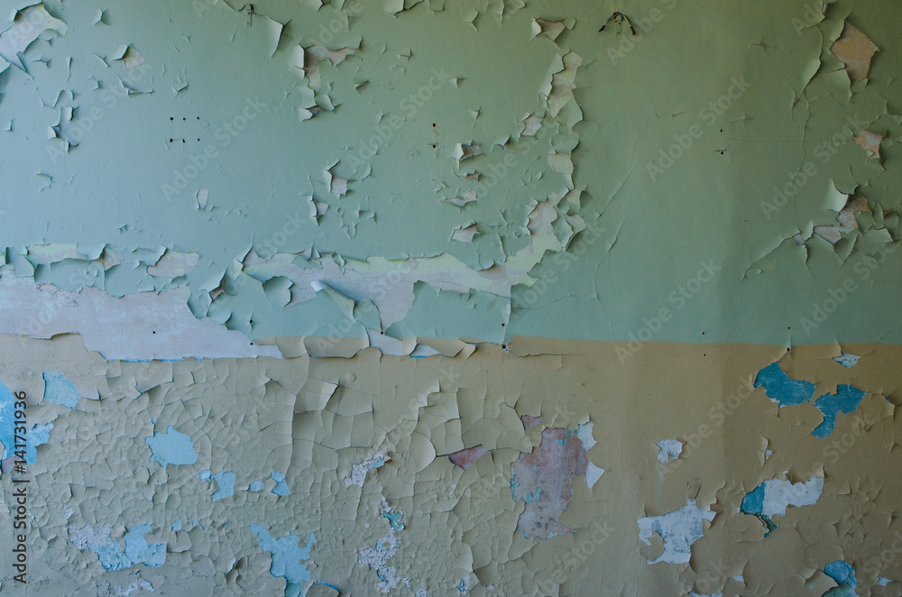 Swollen peeling paint on old wall background texture Stock Photo