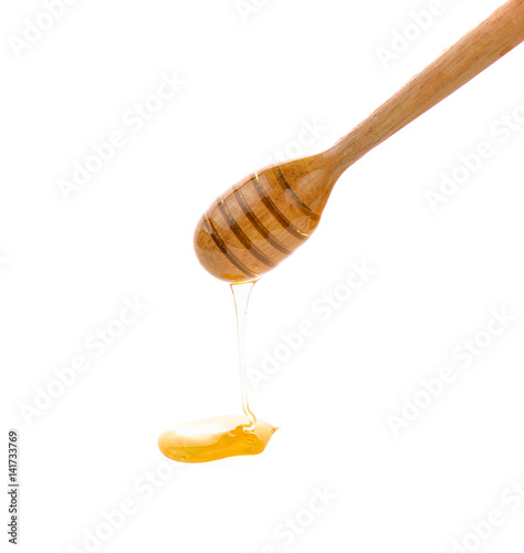 honey dipper on white background