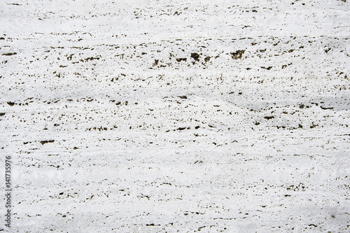  Wall of travertine with stone layers 