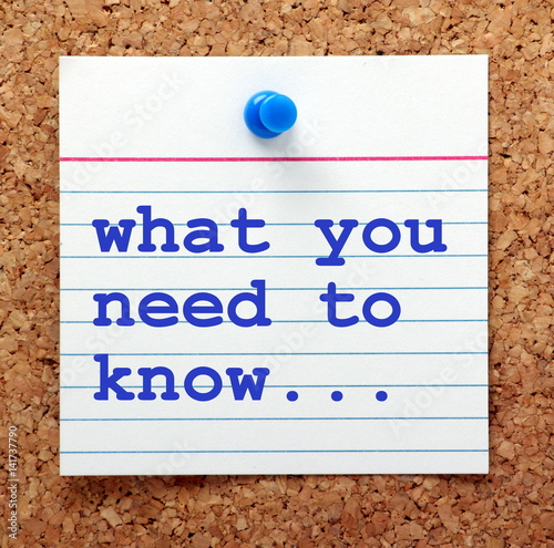 The words What You Need to Know on an index card pinned to a cork notice board as a reminder of resources and knowledge you will require for success