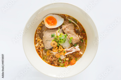 Spicy tom yum noodle with pork