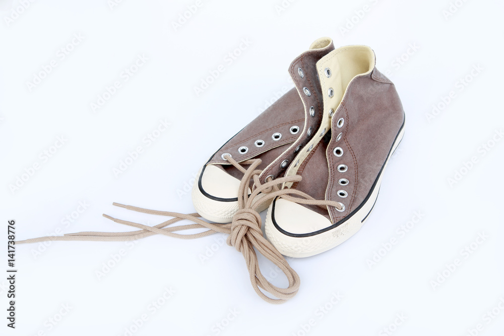 Pair of new sneakers isolated on white background, vintage style image
