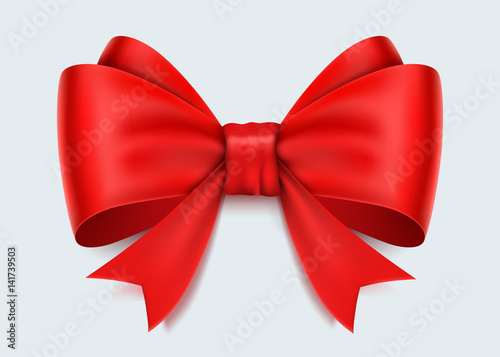Realistic red bow isolated on white background.