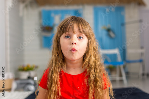 Young girl closeup shows different emotions