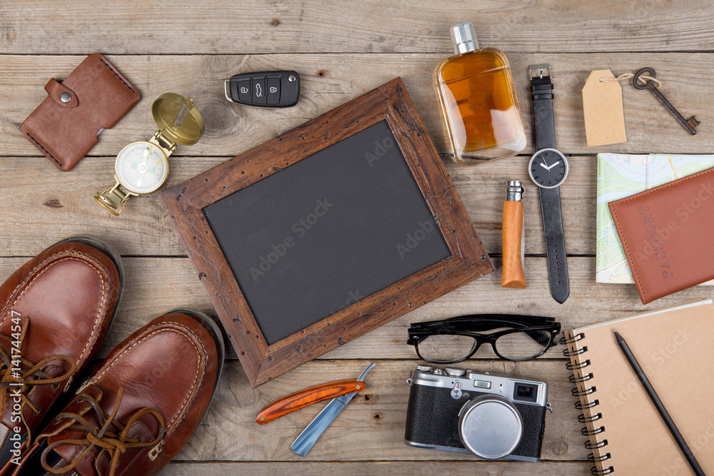Adventure concept - camera, passport, map, notepad, compass and other stuff for travel Adventure concept - camera, passport, map, notepad, compass and other stuff for travel