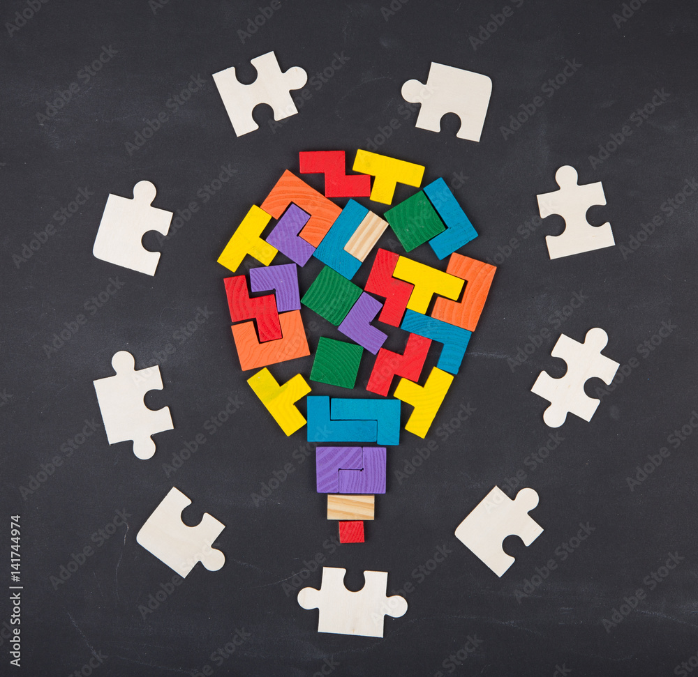 Fototapeta premium Business creative solution concept jigsaw on the blackboard