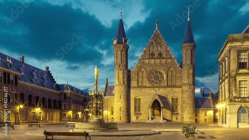 Illuminated gothic facade of Ridderzaal or Hall of Knights in Binnenhof, Hague, Netherlands (static image with animated sky)
 photo