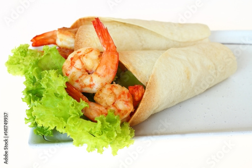 Burritos wraps with shrimp and vegetables.