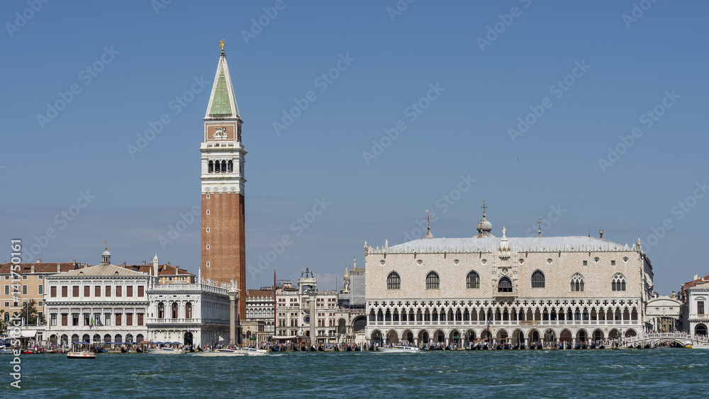 Magnificent panoramic view of Piazza San Marco square and its bell tower, the Doge's Palace and the Ponte dei Sospiri bridge on a sunny summer day, Venice, Italy