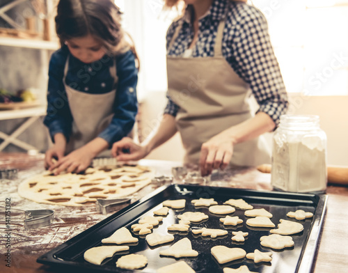 Mom and daughter baking