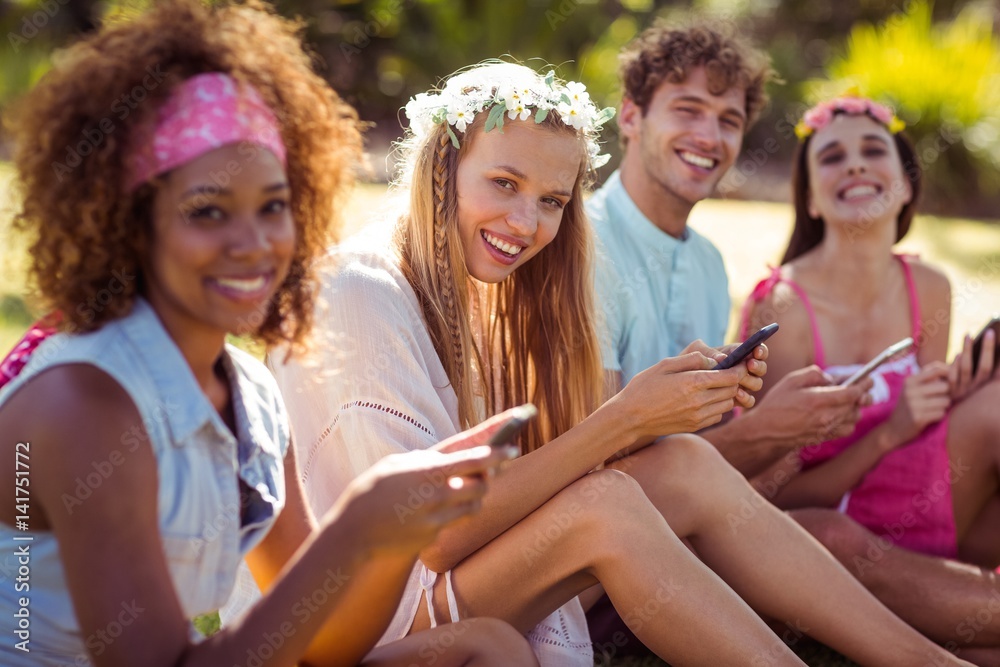 Group of friends using mobile phone Group of friends using mobile phone
