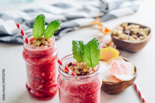 Fényképezés Grapefruit smoothie with muesli cereal